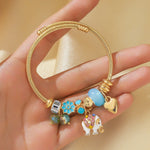 Load image into Gallery viewer, The Golden Wanderlust Charm Bracelet
