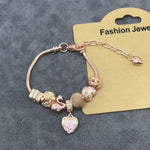 Load and play video in Gallery viewer, The Rose Garden Swan Bracelet
